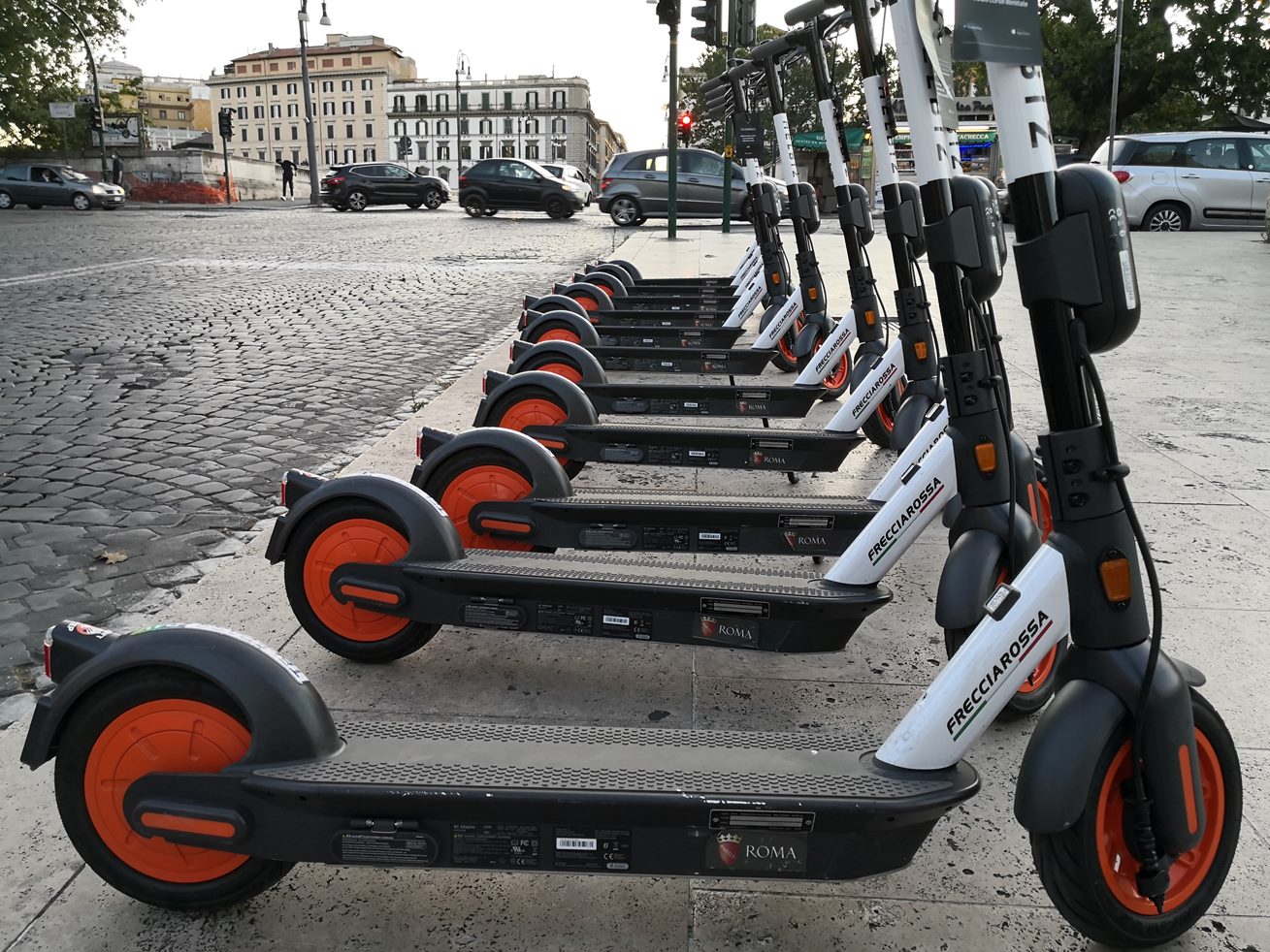 Scooters stand freely on the street. It is important for businesses to protect them from theft. Quazom knows how to do it.